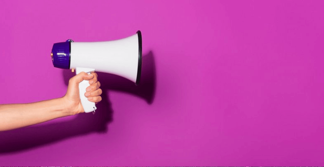 loudspeaker on purple background